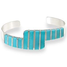 Jay King Sterling Silver Campitos Turquoise Cuff Bracelet  A chic, contemporary design and beautiful blue Campitos turquoise inlay makes this handcrafted sterling silver cuff bracelet a fun, fashionable addition to any accessories collection! From Jay King.       Approx. 6-3/4"L x 3/4"W; fits 6" to 7" wrist     Stamped .925     Sterling silver, contemporary-style cuff bracelet has turquoise rectangles inlaid vertically across top   Stone Information       All sizes and weights approximate     Stabilized Campitos Turquoise - Freeform (4x10mm to 4x20mm); mined in Mexico Turquoise Cuff Bracelet With Polished Finish, Turquoise Sterling Silver Cuff Bracelet With Polished Finish, Modern Turquoise Cuff Bangle Bracelet, Modern Turquoise Cuff Bangle, Modern Turquoise Sterling Silver Jewelry, Modern Turquoise Bracelet Jewelry, Blue Polished Bangle Cuff Bracelet, Modern Turquoise Bracelet, Modern Polished Turquoise Jewelry