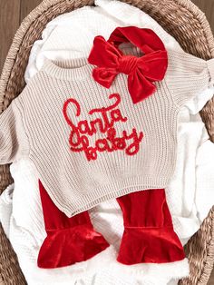 Personalized Hand-Embroidered Baby and Toddler Sweaters. Santa Baby Our charming hand-embroidered "Name" sweaters are the ideal choice for commemorating special moments such as birth announcements, newborn and family photos, baby shower gifts, birthdays, or any memorable occasion! Each embroidery is meticulously crafted by hand, making every sweater a unique and one-of-a-kind masterpiece. You can customize the sweater with your baby's name, select your preferred sweater color, and embroidery color. **Please provide all the custom information for your order in the personalization box at checkout. Refer to the listing photos for available sweater and yarn colors. The size of the embroidery/letters may vary depending on the number of letters and sweater size. These sweaters have an oversized Hand Embroidery Christmas Sweater, Hand Embroidered Baby Gifts, Christmas Embroidery Sweater, Christmas Embroidered Sweater, Embroidered Sweater Outfit, One Year Old Christmas Gifts, Hand Embroidery Sweater, Embroidery Baby Clothes, Christmas Baby Outfits