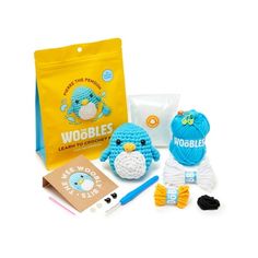 a crochet kit is shown with supplies for the doll and its contents in it