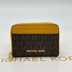 Brand New With Tag Michael Kors Jet Set Travel Md Za Card Case Color: Marigold Gold Tone Logo And Hardware 2 Exterior Front Card Slots 2 Exterior Back Credit Card Slots 4 Interior Credit Card Slots Apprx Dimensions 4.5w X 3.25h X 1d Classic Gold Bag With Card Slots, Gold Bifold Coin Purse For Everyday Use, Classic Gold Coin Purse For Daily Use, Classic Gold Bags With Card Slots, Gold Bifold Bag With Card Slots, Gold Bifold Leather Bag, Gold Coin Purse For Daily Use, Gold Leather Bifold Bag, Gold Wallet With Coin Pocket For Everyday Use