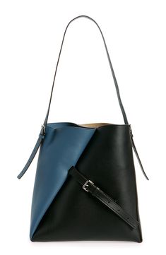 Two-tone colorblocked leather and a diagonally inset buckle strap highlight Marni's innovative approach to fashion with this spacious hobo bag. Open top Shoulder strap Interior wall slip pocket Leather Made in Italy Designer Handbags Modern Hobo Bag With Adjustable Strap For Work, Modern Hobo Bag With Leather Handles For Work, Modern Hobo Bag With Detachable Strap For Office, Designer Black Bucket Bag For Work, Modern Bucket Bag With Detachable Strap For Work, Designer Hobo Bag With Leather Handles For Office, Designer Crossbody Hobo Bag For Office, Designer Office Hobo Bag With Leather Handles, Modern Hobo Bag With Leather Handles For Office