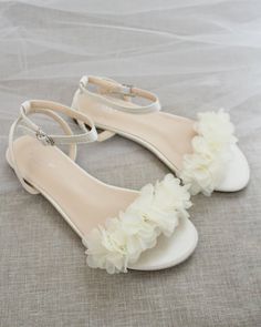 Classy satin flat sandals with a chiffon flowers and ankle strap. Effortless yet adorable to wear on your favorite occasion. Can be pair with dress or casual look.DETAILS:COLORS AVAILABLE: Ivory, White, Pink, Light Blue, and ChampagneUPPER: Synthetic upper and liningMATERIALS: Mandmade outsoleSTYLE NAME: MADDY Summer Wedding Shoes With Flat Heel For Prom, Flat Heel Wedding Shoes For Summer Prom, Flat Summer Wedding Shoes For Bridesmaids, Summer Flat Heel Bridesmaid Wedding Shoes, Summer Wedding Shoes With Flat Heel For Bridesmaids, Summer Bridesmaid Wedding Shoes With Flat Heel, Low Heel Bridesmaid Wedding Shoes For Summer, Low Heel Summer Wedding Shoes For Bridesmaid, Flat Sandals For Spring Wedding