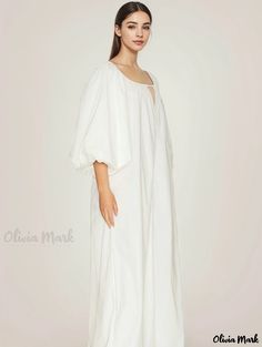 Olivia Mark - Simple yet Elegant: Loose-Fit Cotton Dress with Lantern Sleeves and Wide Collar Relaxed Fit Square Neck Dress For Spring, Elegant Dress With Gathered Sleeves And Relaxed Fit, Elegant Unlined Relaxed Fit Dresses, Elegant Relaxed Fit Unlined Dresses, Elegant Relaxed Fit Dress, Elegant Maxi Dress With Gathered Sleeves For Vacation, Elegant Vacation Dress With Gathered Sleeves, White Beach Dresses With Gathered Sleeves, Elegant Relaxed Fit Dress For Brunch