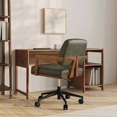 an office chair sits in front of a desk with bookshelves and a bookcase