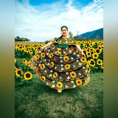 The Beautiful Chiapaneca Dress Is A Masterpiece From The Chiapas Artisans! Fully Handmade With Vivid Sunflowers Silky Shiny Embroidery, It's A Favorite For Mexican Fiestas! The Campesina Off The Shoulder Top Is Made With A Shoulder Adjustable String. The Skirt Is Also Adjustable To Most Sizes. The Embroidery Covers The Entire Skirt And Blouse, Back And Front. Please Note That This Is The Fiesta Version And It's Not Suitable For Professional Dancers. We Carry Another Set With A Double Width Skirt Mariachi Dress, Chiapas Dress, Mexican Sunflower, Mexican Textiles, Blouse Back, Silk Dresses, Mexican Dresses, Professional Dancers, Skirt And Blouse