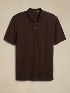 A style for all seasons, this ultra soft cotton polo is crafted to stay fresh even when things heat up.  Anti-Odor, Moisture-Wicking Polo collar with button placket.  Straight hem with vented sides.  Standard fit.  Short sleeves.  Hip length.  Body l Brown Polo Shirt, Brown Polo, Stay Fresh, Cotton Polo, Polo Collar, Mens Polo Shirts, Hip Length, Button Placket, Moisture Wicking