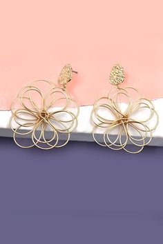 A fusion of floral beauty and modern design that will elevate your style and add a touch of sophistication to any outfit. These exquisite earrings feature intricately crafted matte flowers that are delicately entwined, creating a unique and elegant accessory.Product Details:length: 2.5" width: 1.75" earring back: Postmetal finish: gold, rhodium Platingproduct: Lead & Nickel Compliantanti-tarnish: Double E-coating Filigree Flower Earrings, Elegant Metal Flower Charm Earrings, Elegant Metal Flower Earrings, Flower Dangle Earrings, Post Metal, Rounded Rectangle, Sunglass Chain, Wall Accessories, Elegant Accessories