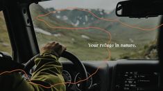 a man driving a car with the words your refuge in nature