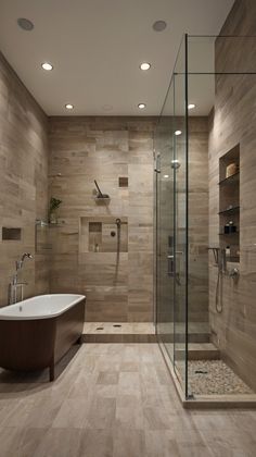 a bathroom with a bathtub, sink and shower in the middle of the room