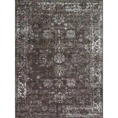 an area rug with grey and white colors