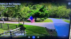 a television screen showing an american flag in the country