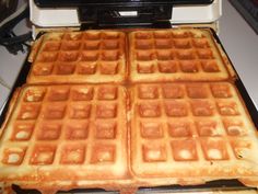 the waffles are being cooked on the stove