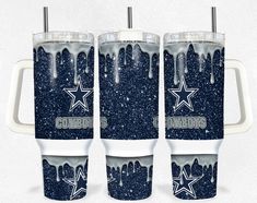 three tumblers with the word cowboys painted on them