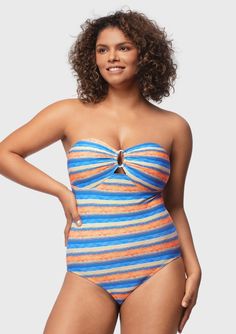 Introducing our Multiway One-Piece Swimsuit, designed for both style and sustainability. Crafted from recycled fabric, this swimsuit ensures a smooth, long-lasting fit while retaining its shape. The standout feature is the silver ring detail at the front, adding a touch of elegance. What sets this swimsuit apart is its versatility – it comes with removable multiway straps. Whether you prefer the classic strap style, a chic halter, or a strapless look, you can customize it to suit your mood and c Striped Stretch Swimwear For Sunbathing, Striped Stretch Tankini For Pool, Striped Swimwear With Lined Body For Poolside, Striped Lined Swimwear For Poolside, Striped Stretch One-piece Swimwear, Striped One-piece Swimwear For Poolside, Minimiser Bra, Striped One Piece, Color Stripes