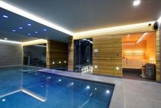 Indoor Guncast Swimming pool with spa Cool Basement Ideas, Hgtv House, Basement Layout, Rustic Basement