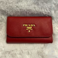 Reposhing This Item I Purchased From @Bridgitsbuys. Loved It, But Ready To Rotate For Something New. Questions? Leave A Comment Below! Elegant Red Wallet For Business, Elegant Red Wallets For Business, Prada Red, Leather Key Holder, Prada Accessories, Leather Key, Key Card Holder, Key Holder, Card Holders