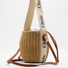 SPECIFICATIONSStyle: CasualSize: (30cmShape: BucketPattern Type: SolidOrigin: CN(Origin)Occasion: VersatileNumber of Handles/Straps: SingleMain Material: StrawInterior: No PocketHardness: SoftHandbags Type: Day ClutchesGender: WOMENClosure Type: STRINGBrand Name: SATSEED      尺寸规格:上口35CM 高23CM                高18CM 上口直径17CM     细节展示: Body Fashion, Straw Handbags, Ladies Purse, Fashion Tote Bag, Womens Handbags, Straw Tote, 19 Days, Bag Luxury, Leather Bucket Bag