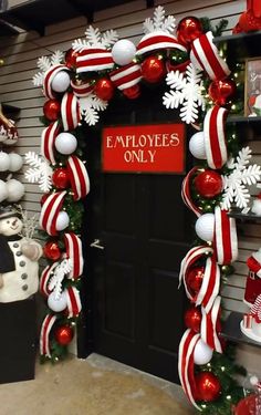 an entrance decorated with red and white ornaments