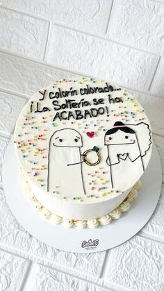 a birthday cake with two people on it