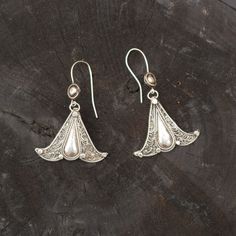 Handmade Sterling Filigree earrings Approximate dimensions L1.5 X w 1 Inches Silver Dangle Earrings With Bells, Ornate Sterling Silver Teardrop Filigree Earrings, Bell Drop Earrings As Gift, Bell Drop Earrings For Gifts, Traditional Silver Earrings With Bells, Traditional Silver Bell Earrings, Silver Filigree Teardrop Earrings For Gift, Traditional Silver Teardrop Pierced Earrings, Ornate Filigree Pendant Earrings