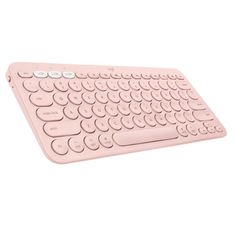 a pink computer keyboard on a white background