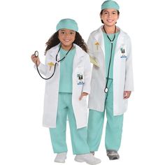 two children dressed in white coats and green pants, one holding a stethoscope