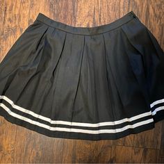 Never Worn Was Going To Use For A Costume But Never Did Tags Still Attached Black Cotton Mini Pleated Skirt, Black Cotton Tennis Skirt, Black Cotton Lined Tennis Skirt, Black Cotton Tennis Skirt With Lining, Preppy Black Skort For Spring, Preppy Black Cotton Skirt, Black Preppy Skort For Spring, Preppy Black Spring Skort, Black Cotton Pleated Skirt With Lining