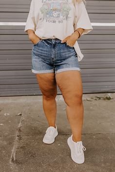 - Perfect for sunny days and warm nights, these chic denim shorts bring a laid-back summer vibe to your OOTD! - Unlined stretchy denim with faded accents - A waistline with belt loops, a hidden zip fly, and button closure - Functional front and back pockets - A flattering silhouette that ends in cuffed hemlines Measurements 1XL : Front Rise 11", Hip 40", Inseam 5", Length 15.5", Waist 34". 2XL : Front Rise 11.5", Hip 42", Inseam 5", Length 15.5", Waist 36". 3XL : Front Rise 12", Hip 44", Inseam Dark Wash Denim Shorts Outfit, Hot Weather Outfits, Jean Short Outfits, Denim Shorts Outfit, Curvy Style, Summer 2025, Denim Chic, Curvy Women Outfits, High Waist Shorts