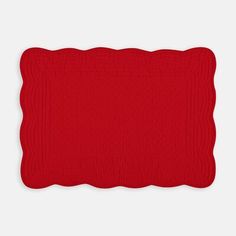 a red place mat on a white background