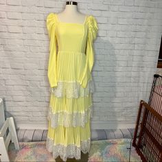 Free Shippingthis Yellow Dress Is Size Xs And Brand New! It Was Only Worn For The Second Photo. It Features A Tiered Design With White Lace Trim Along With Leg Of Mutton Sleeves For A Dramatic Finish. The Squared Neckline Is Super Flattering On Anyone. There’s A Hidden Zipper On One Side To Get The Dress On/Off With Easeall Photos Are Minemade Of 95% Polyester And 5% Spandex Measurements: Length-54” Bust-30”-38” Waist-26” Relaxed Shoulder-21” Sleeve-25” Yellow Tiered Spring Dress, Yellow Long Sleeve Ruffled Maxi Dress, Yellow Ruffled Long Sleeve Maxi Dress, Yellow Long Sleeve Maxi Dress With Ruffles, Yellow Fitted Dress With Lace Trim, Southern Belle Dress, Kimono Mini Dress, Xxxl Dress, Squared Neckline