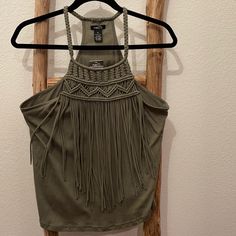 New With Tags Never Worn Olive Green Fringe Tank Size Xl Trendy Sleeveless Fringe Tops, Casual Fringe Tank Top For Festivals, Casual Summer Tops With Fringe, Casual Fringe Tops For Summer, Casual Fringe Tank Top For Summer, Spring Casual Fringe Tank Top, Casual Fringe Tank Top For Spring, Casual Fitted Fringe Tank Top, Casual Fringe Tank Top For Vacation