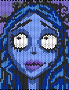 an image of a woman with blue hair and eyes made out of legos on the side of a wall