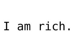 the words i am rich are in black and white