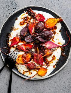 a plate filled with food on top of a table