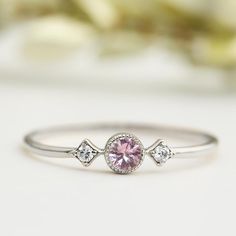 September - Pink Sapphire Star & Moon Ring – Envero Jewelry Dainty Diamond Birthstone Promise Ring, Diamond Ring With Gemstone And Round Band, White Gold Diamond Birthstone Ring With Round Band, Rose Gold Diamond Birthstone Ring, White Gold Cubic Zirconia Diamond Ring With Birthstone, Silver Diamond Stackable Rings With Birthstones, White Gold Diamond Ring With Cubic Zirconia Birthstone, White Gold Diamond Birthstone Ring, Rose Gold Birthstone Ring With Ethical Diamonds