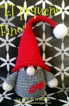 a crocheted stuffed animal with a red hat on it's head and the words el pequeno fino written in spanish