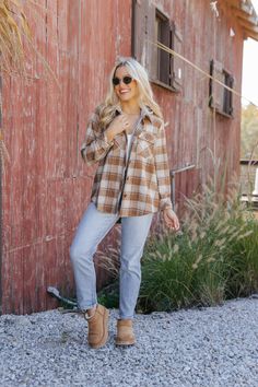 This Brown Plaid Hooded Shacket is a cozy layer that combines the best of a shirt and jacket! This versatile piece features buttoned cuffs, a classic collared neckline, and an attached hood for added warmth. The zip-up front closure is paired with a button-down front for a unique look, while the flap chest pockets add a touch of functionality. Crafted with a timeless allover plaid pattern and contrast detailing, this shacket is perfect for adding a rustic-chic vibe to your fall wardrobe! Hooded Shacket, Revival Clothing, Fall Style Guide, Gameday Dress, Loungewear Dresses, Casual White Dress, Game Dresses, Brown Plaid, Rustic Chic