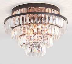 a chandelier hanging from the ceiling in a room