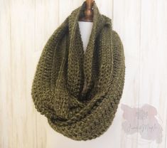 "❤️A olive green infinity scarf ready for delivery! This handmade winter scarf is super soft and made from 100% Acrylic yarn. The olive green color of this item is shown in the image listing.  ❤️It measures approximately: 10\" wide and 66\" long.    ❤️Care Instructions: Machine wash cool, on a gentle cycle, lay flat to dry.     ❤️Please let us know if you have any questions or concerns! ❤️Thank you so much for shopping with us! For more products, return to our shop here: https://www.etsy.com/shop/JuneAndMaple" Green Crochet, Scarf Handmade, Green Scarf, Olive Green Color, Infinity Scarf, Winter Scarf, Acrylic Yarn, Crochet Scarf, Green Color