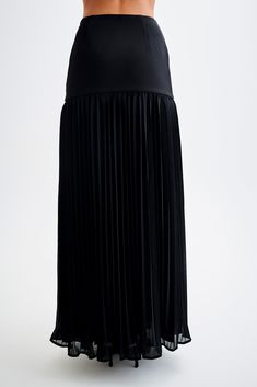 Going with the flow.The JILLIAN Pleated Maxi Skirt is a sophisticated and elegant addition to any wardrobe. This high-waisted skirt features a fitted yoke that transitions into a beautifully pleated chiffon lower skirt, offering a graceful flow and movement. With its maxi length, it exudes timeless charm. Pair it with the Letitia Suiting Halter Top with Buckle for a chic and polished ensemble. Capsule Wardrobe Accessories, Going With The Flow, European Summer Outfits, Maxi Dress Sale, Pleated Chiffon, Pleated Maxi Skirt, Capsule Outfits, Beige Dresses, Pleated Maxi