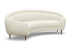 the curved sofa is white and has wooden legs on both sides, along with an arm rest