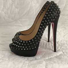 This Black Spiked Christian Louboutin Stiletto Shoes. Used. Limited Edition. Studded Fitted Heels For Formal Occasions, Formal Studded Fitted Heels, Formal Fitted Studded Heels, Designer Spiked High Heels, Black Spiked Evening Heels, Black Spiked Heels For Evening, Luxury Spiked Round Toe Heels, Black Studded Party Heels, Black Studded Heels For Party