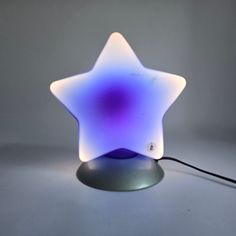 a star shaped light sitting on top of a table