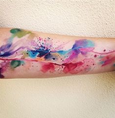 the arm is covered with watercolor paint