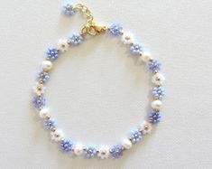 Blue and White Flower Bracelet, Daisy Beaded Bracelet, Stainless Steel Jewelry, Freshwater Pearl Bracelet - Etsy Bracelet Pearl Ideas, Self Made Bracelets, Homemade Jewelry Bracelets, Cute Beaded Bracelets, Flower Pearl Bracelet, Blue Flower Bracelet, Daisy Flower Bracelet, Bracelet With Pearls, Pearl Bracelet Gold