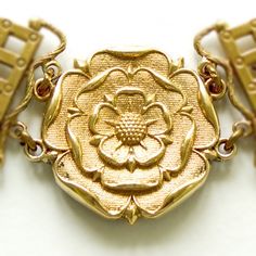 'Rose' link from the Tudor Chain of Office. England, 15-16th cent. Width 47 mm, height 44 mm. Brass cast. Medieval Style Gold Jewelry With Antique Finish, Medieval Historical Design Gold Jewelry, Medieval Gold Bracelet Jewelry, Medieval Metal Jewelry With Antique Finish, Medieval Style Metal Jewelry With Antique Finish, Medieval Style Gold Bracelet, Knight Orders, Medieval Accessories, Medieval Belt