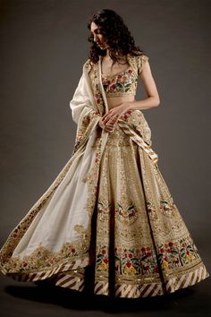 Editor's Note Chanderi Silk Lehenga With Resham Thread Embroidery And Hand Embroidery Work Paired With Chanderi Silk Embroidered Dupatta & Blouse Color: Ivory Fabric: Chanderi Silk Care... Chanderi Silk Lehenga, Hand Embroidery Work, Rohit Bal, Embroidered Lehenga, Embroidered Dupatta, Silk Lehenga, Indian Fashion Designers, Thread Embroidery, Silk Dupatta