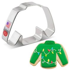 Our Ugly Sweater Cookie Cutter, SKU 1966N, measures 4.25 in. x 3 in. x 1 in. (10.8 x 7.6 x 2.54 cm) and is manufactured in the United States with certified food-safe USA made steel by Ann Clark Cookie Cutters. At Ann Clark we know cookie cutters and the people who use them; from first-time bakers to the worlds best cookies, we have got you covered. Whether youre looking for a classic like your grandmothers snowflake or the latest trends, we offer over 1,000 shapes for any occasion. From our faci Worlds Best Cookies, Clark Griswold Christmas Vacation, Ugly Christmas Sweater Cookies, Ugly Sweater Cookie, Ugly Sweater Party Invitations, Ugly Sweater Diy, Christmas Party Themes, Ugly Sweater Party, Long Sleeve Jersey