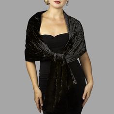 A very elegant velvet shawl for your wedding party or evening dress. Made of luxury bridal velvet.  Color: black  (other colors are available)  Size: 190 cm x 48 cm approx. The shawl on the photo is not lined.  Choose: one sided or double sided (both sides velvet)  For additional request, please contact.  You can use it as a wrap, shawl or stola. WE have matching bags in our Etsy Shop! WE accept credit cards! Warning: Although the fabric we use is of high quality, in certain cases during high hu Luxury Festive Velvet Shawl, Elegant Velvet Winter Dress, Elegant Black Velvet Holiday Dress, Elegant Winter Velvet Dress, Elegant Fitted Shawl For Evening, Elegant Velvet Dress For Wedding, Elegant Black Velvet Dress For Gala, Formal Fitted Black Shawl, Elegant Evening Shawl Wrap