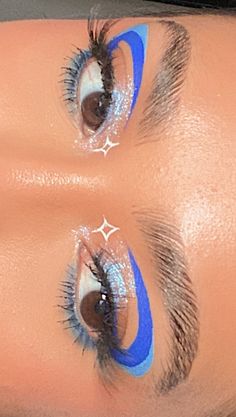 Space Eyeliner Looks, Blue Beetle Makeup, Blue And White Graphic Liner, Graphic Eyeliner Makeup Looks, Blue Liner Looks, Purple And Blue Eyeliner, Blue Graphic Eye Makeup, Light Blue Graphic Liner, 2 Color Eyeliner